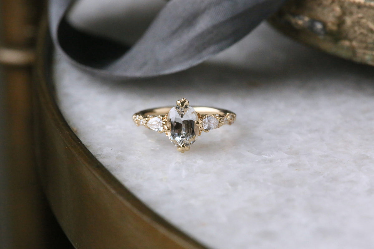 The Belladonna En Trois Ring in Natural White Sapphire